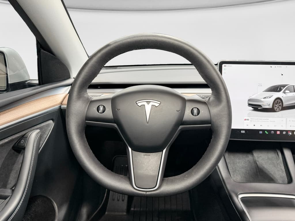 2025 Tesla Model Y view 7